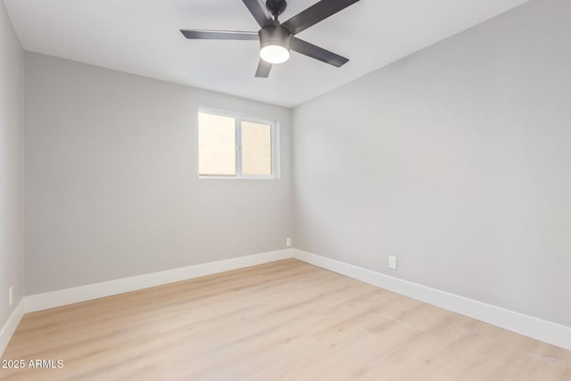 unfurnished room with ceiling fan and light wood-type flooring