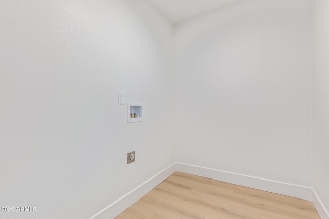 laundry room featuring hookup for a washing machine, hookup for an electric dryer, and hardwood / wood-style flooring