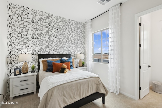 bedroom featuring carpet, visible vents, and baseboards