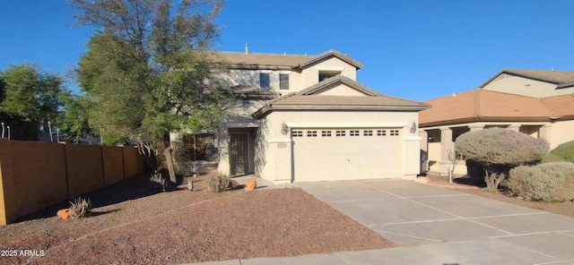 view of front of property with a garage