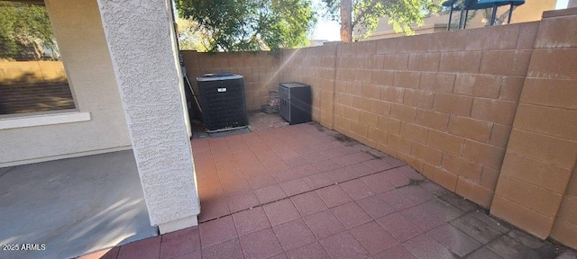 view of patio with central AC unit