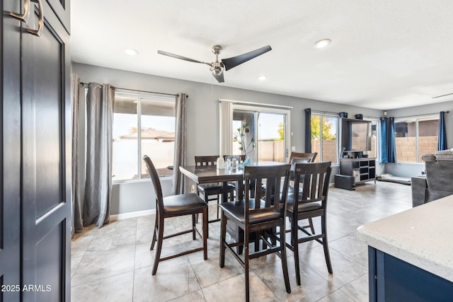 dining area featuring ceiling fan