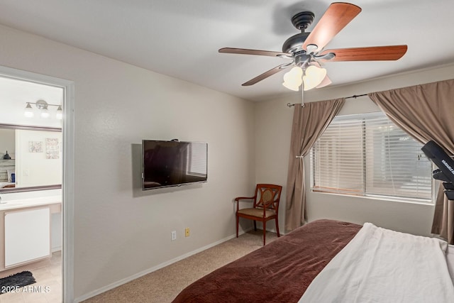 bedroom with baseboards, ceiling fan, and light colored carpet