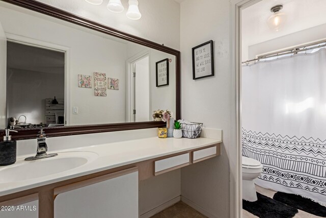 full bathroom with a shower with shower curtain, tile patterned flooring, vanity, and toilet