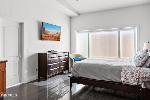 bedroom with baseboards