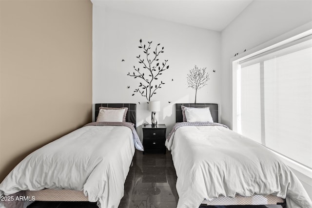 bedroom featuring granite tiled floors