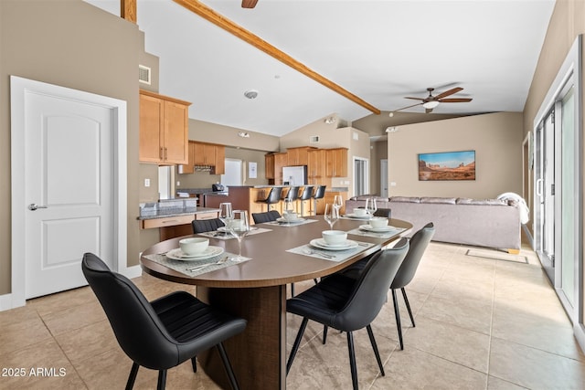 dining area with a ceiling fan, light tile patterned flooring, and baseboards