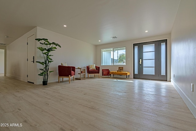 unfurnished room featuring light hardwood / wood-style flooring