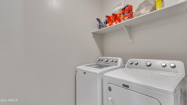 laundry room featuring separate washer and dryer