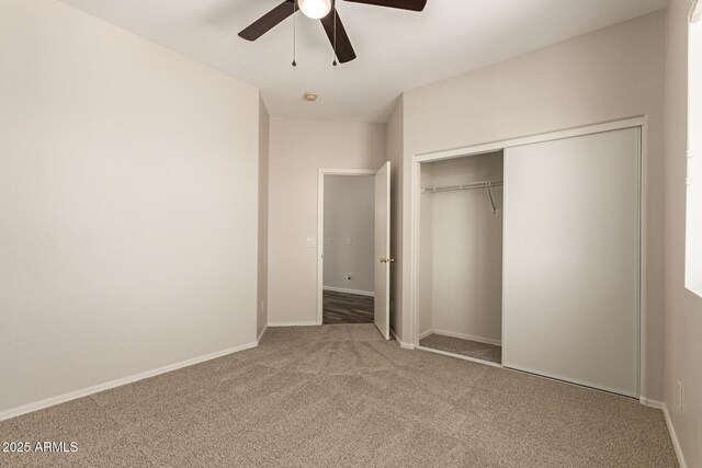 17493 N Costa Brava Ave, Maricopa, AZ 85139 - unfurnished bedroom with carpet, a closet, and ceiling fan