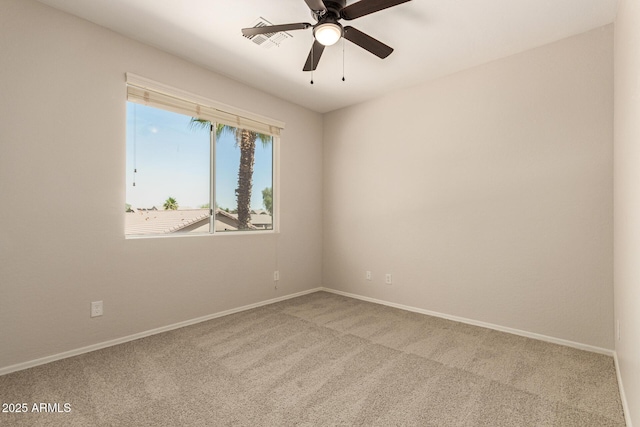 17493 N Costa Brava Ave, Maricopa, AZ 85139 - carpeted empty room with a ceiling fan and baseboards