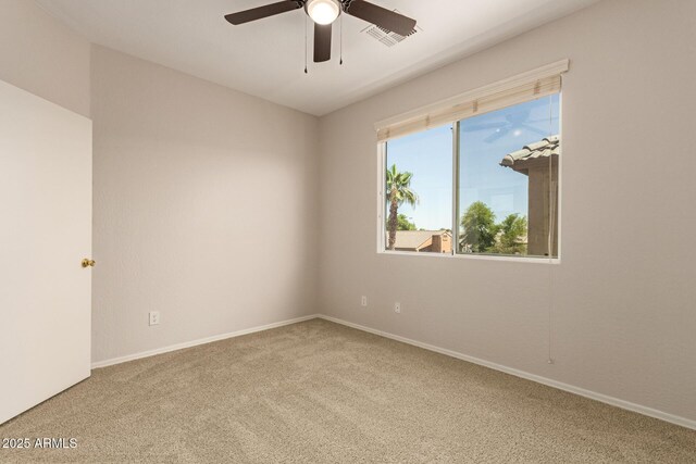 17493 N Costa Brava Ave, Maricopa, AZ 85139 - unfurnished room with carpet floors and a ceiling fan