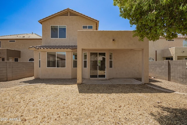 17493 N Costa Brava Ave, Maricopa, AZ 85139 - back of house featuring stucco siding, a fenced backyard, and a patio