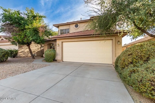 view of front of home with a garage