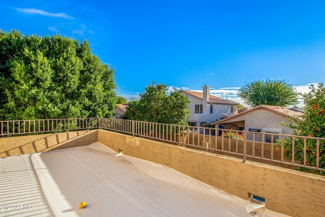 view of patio featuring a balcony