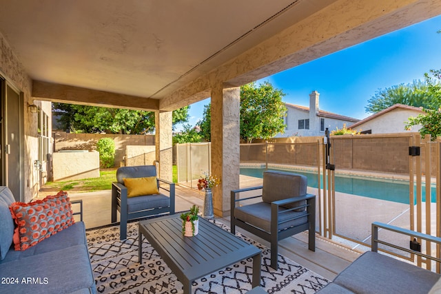 view of patio with a fenced in pool