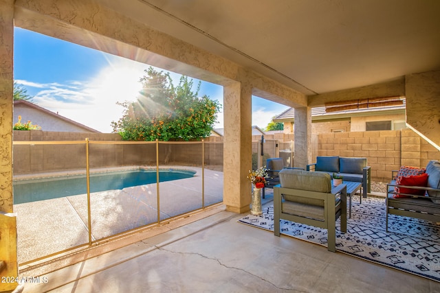 view of patio featuring a fenced in pool