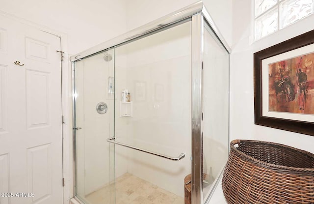 full bathroom featuring a shower stall