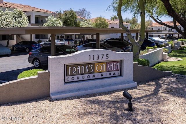11375 E Sahuaro Dr Unit 1055, Scottsdale, AZ 85259 - community sign featuring covered parking and a residential view
