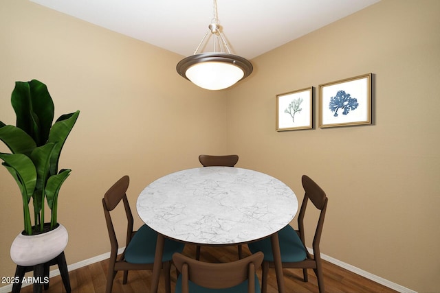 11375 E Sahuaro Dr Unit 1055, Scottsdale, AZ 85259 - dining space with dark wood-style floors