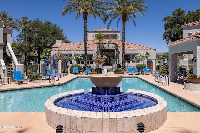 11375 E Sahuaro Dr Unit 1055, Scottsdale, AZ 85259 - community pool featuring a patio