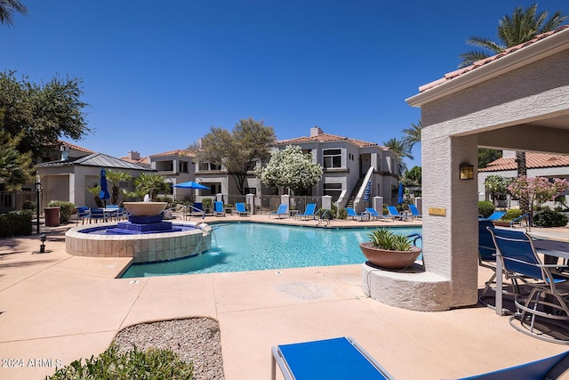 11375 E Sahuaro Dr Unit 1055, Scottsdale, AZ 85259 - community pool with a patio area