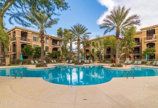 view of pool with a patio area