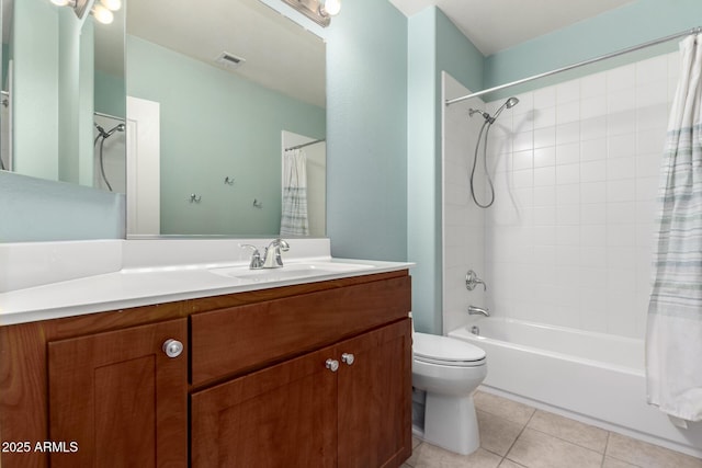 full bathroom featuring tile patterned flooring, vanity, toilet, and shower / tub combo with curtain