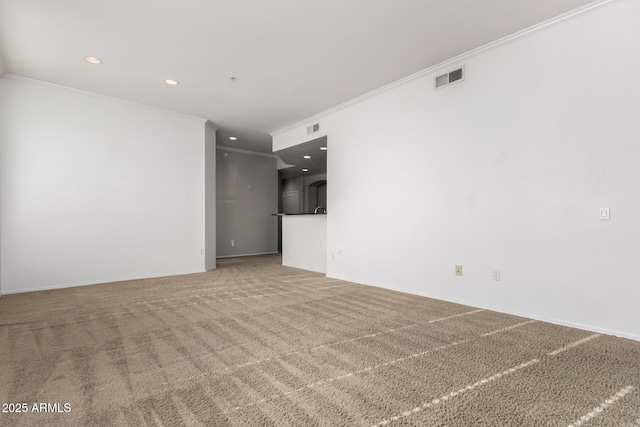 interior space with carpet flooring and ornamental molding