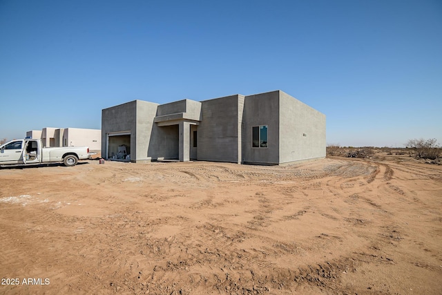 view of pueblo revival-style home