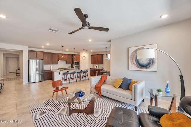 19908 W Montecito Ave, Litchfield Park, AZ 85340 - living area featuring a ceiling fan, recessed lighting, and light tile patterned floors