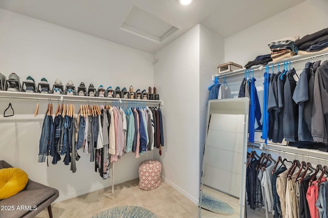 19908 W Montecito Ave, Litchfield Park, AZ 85340 - walk in closet featuring attic access and tile patterned flooring