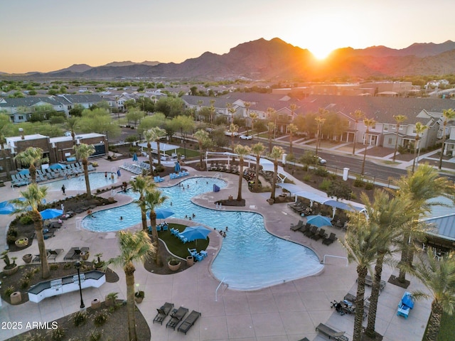19908 W Montecito Ave, Litchfield Park, AZ 85340 - community pool featuring a mountain view, a residential view, and a patio area