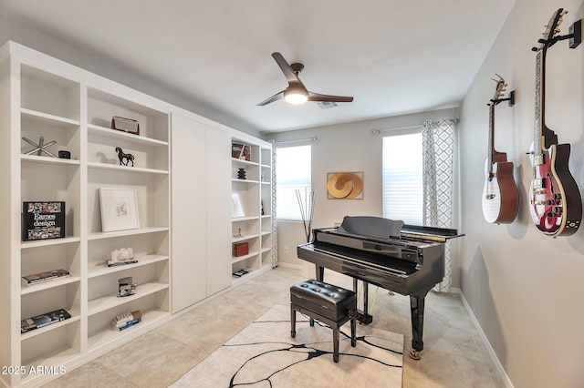 19908 W Montecito Ave, Litchfield Park, AZ 85340 - living area with ceiling fan, light tile patterned floors, and built in features