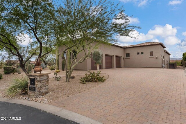 view of side of property featuring a garage