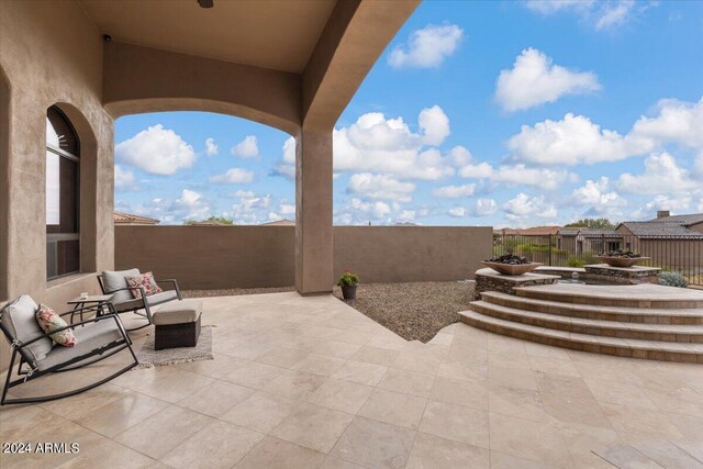 view of terrace with an outdoor living space