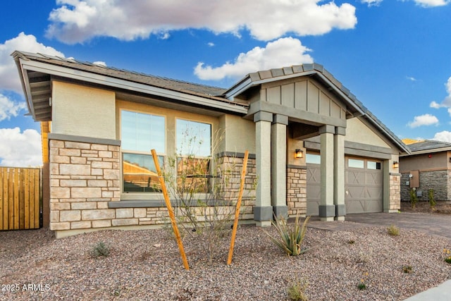 view of front of property with a garage