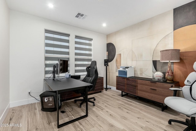 home office featuring light hardwood / wood-style floors