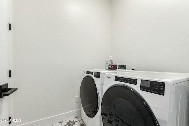 laundry room with washing machine and dryer