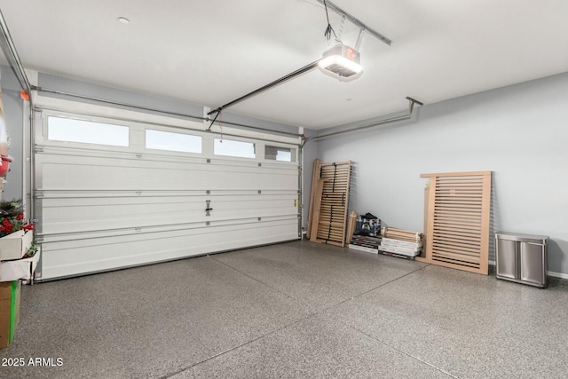 garage featuring a garage door opener