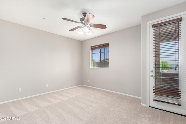 9148 W Meadow Dr, Peoria, AZ 85382 - unfurnished room with light colored carpet, baseboards, and a ceiling fan