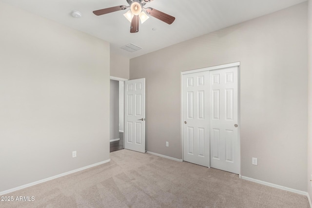9148 W Meadow Dr, Peoria, AZ 85382 - unfurnished bedroom featuring carpet, a closet, baseboards, and a ceiling fan