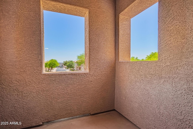 9148 W Meadow Dr, Peoria, AZ 85382 - empty room with a textured wall and concrete flooring