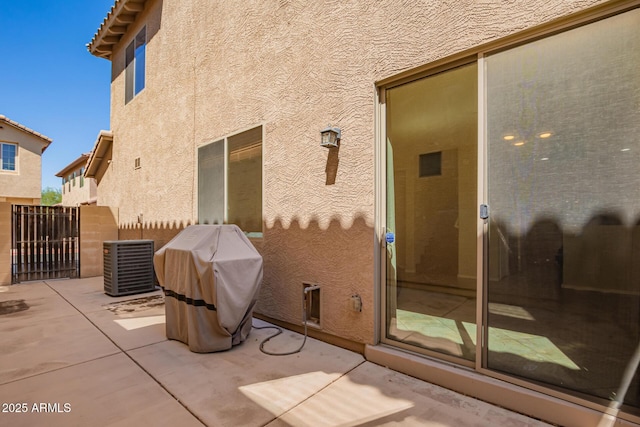 9148 W Meadow Dr, Peoria, AZ 85382 - back of house featuring central AC unit, stucco siding, a patio, and fence
