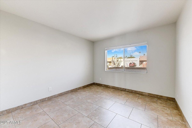 view of tiled spare room