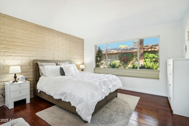 bedroom featuring dark hardwood / wood-style floors