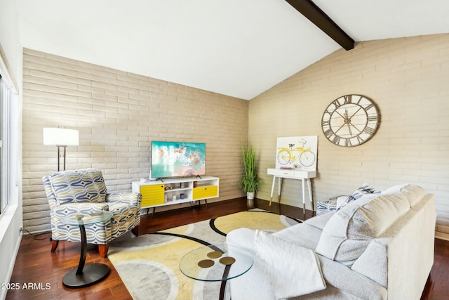 living room with brick wall, lofted ceiling with beams, and wood-type flooring