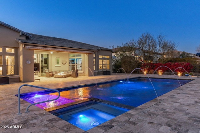 view of swimming pool featuring a fenced in pool, a patio area, outdoor lounge area, and an in ground hot tub