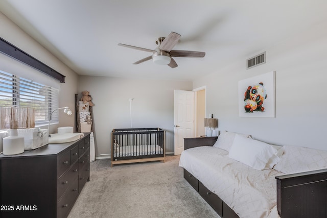 8135 N Central Ave Unit 1, Phoenix, AZ 85020 - bedroom featuring light colored carpet and a ceiling fan