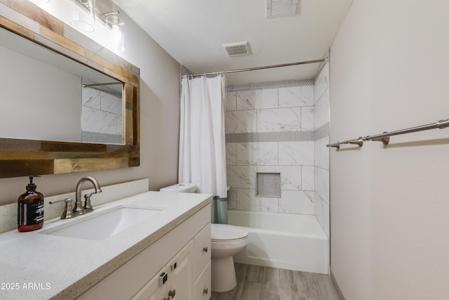 8135 N Central Ave Unit 1, Phoenix, AZ 85020 - full bathroom with toilet, wood finished floors, vanity, and shower / bath combo
